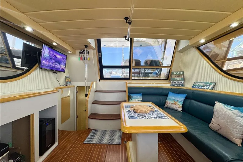 Slide: The Image of Luxurious interior of 1994 President 445 Sundeck yacht with cozy seating and modern amenities. - 64
