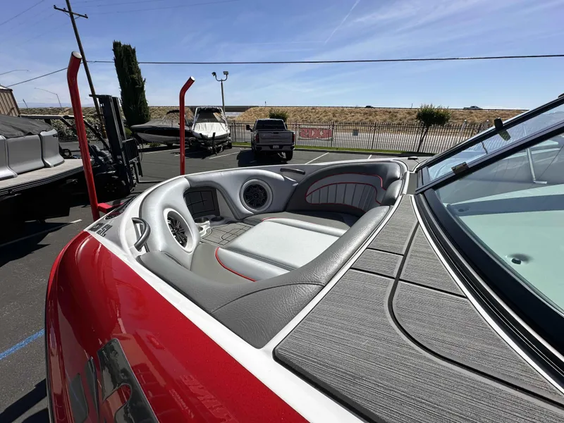 Slide: The Image of 2024 Sanger 231 SL boat interior with sleek seating and modern design. - 10