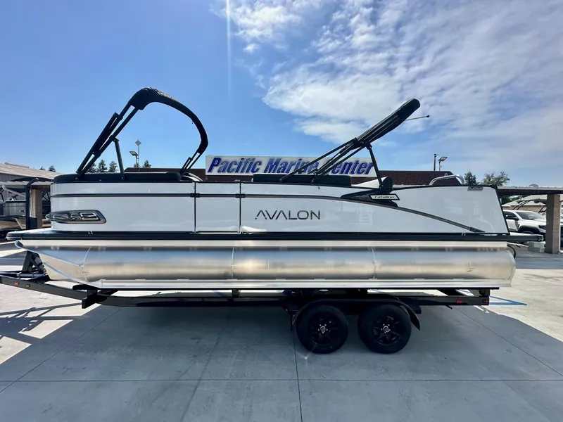 Slide: The Image of 2025 Avalon Catalina 23 FT pontoon boat with versatile rear bench and 200HP Mercury engine. - 1