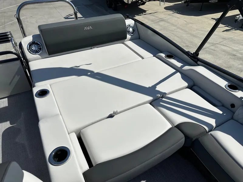 Slide: The Image of 2025 Avalon Catalina boat with versatile rear lounger, cup holders, and sleek design. - 14