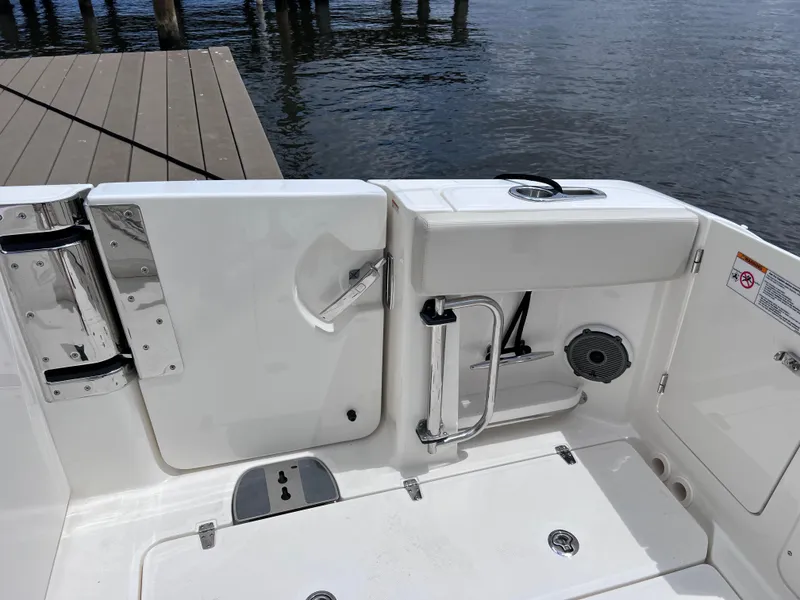 Slide: The Image of 2022 Boston Whaler 320 Vantage boat deck, featuring a sleek design and modern amenities. - 19