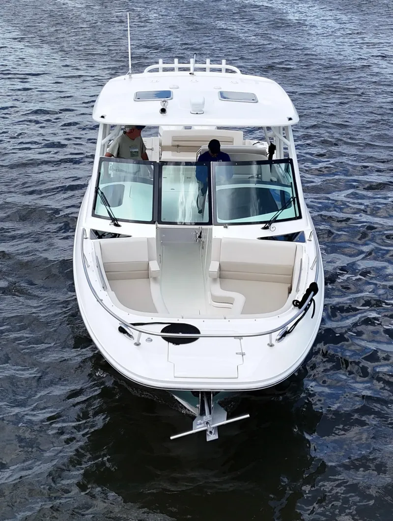 Slide: The Image of 2022 Boston Whaler 320 Vantage boat on water, aerial view, joystick control, mint condition. - 3