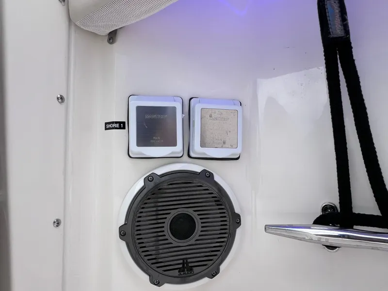 Slide: The Image of Boston Whaler 320 Vantage 2022 boat interior with speaker and control panels. - 30