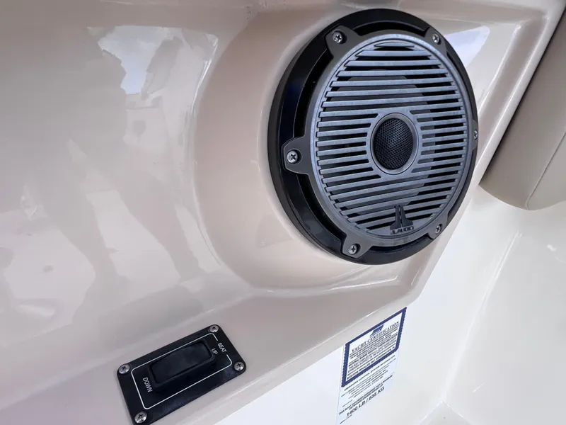 Slide: The Image of Speaker and control panel on 2022 Boston Whaler 320 Vantage boat. - 41