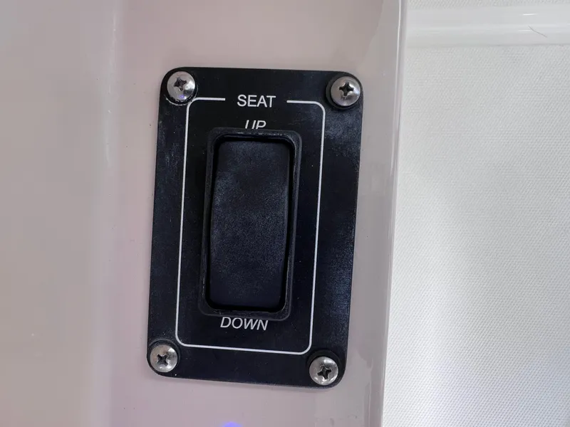 Slide: The Image of Seat adjustment switch on 2022 Boston Whaler 320 Vantage boat. - 42