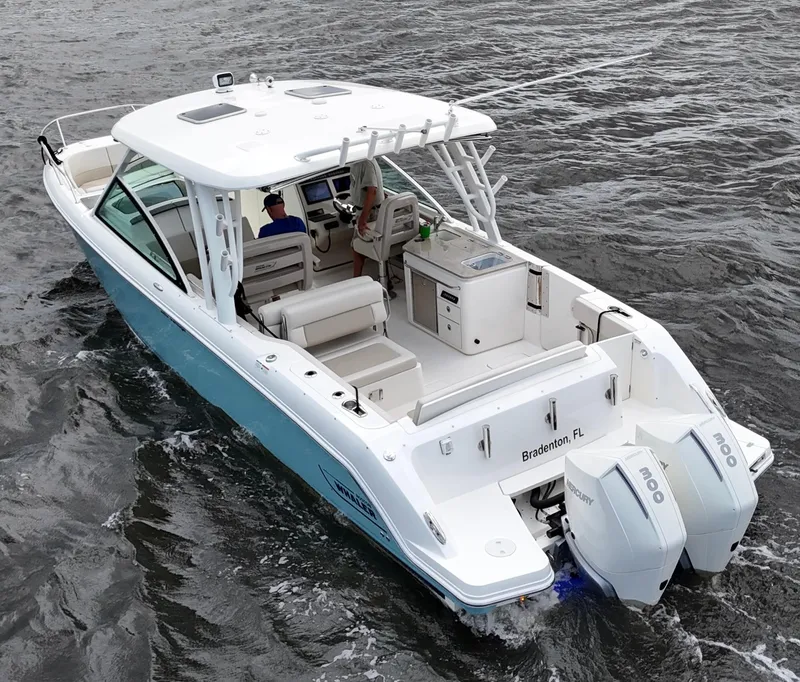 Slide: The Image of Boston Whaler 320 Vantage 2022 boat cruising with joystick control, Bradenton, FL. - 6