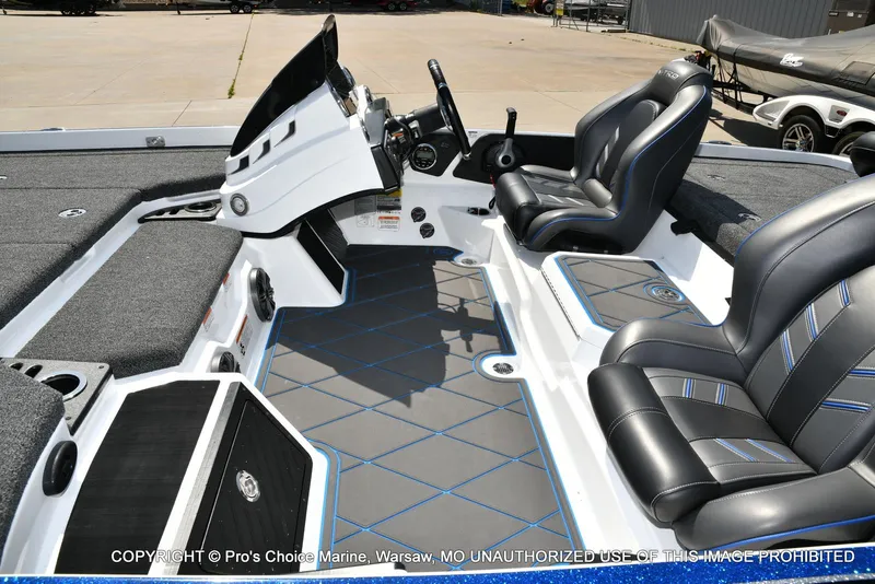 Slide: The Image of 2023 Nitro Z21 XL Pro boat interior with sleek seating and modern dashboard design. - 16