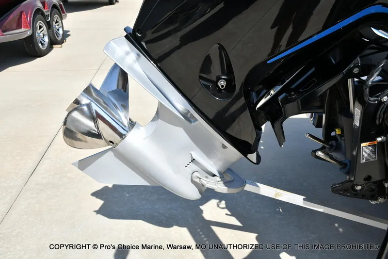 Slide: The Image of 2023 Nitro Z21 XL Pro boat engine with shiny propeller on display. - 24