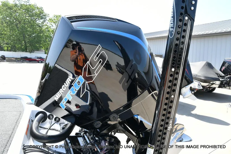 Slide: The Image of 2023 Nitro Z21 XL Pro with Mercury Pro XS engine, outdoor setting. - 27