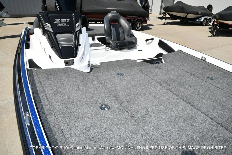 Slide: The Image of 2023 Nitro Z21 XL Pro boat with spacious deck and sleek design. - 37