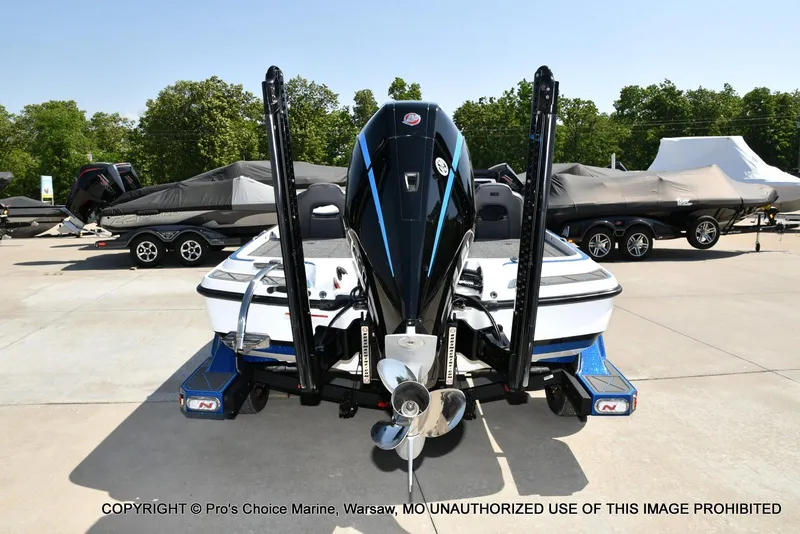 Slide: The Image of 2023 Nitro Z21 XL Pro boat, rear view, parked outdoors on concrete surface. - 4