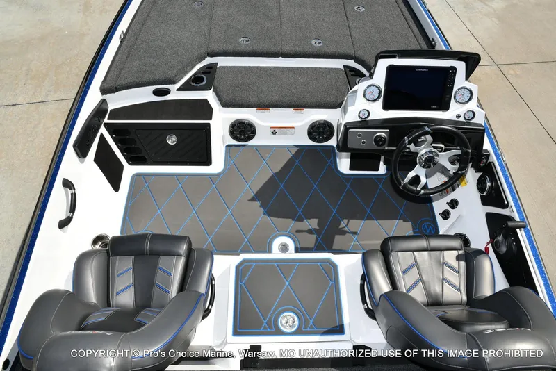 Slide: The Image of 2023 Nitro Z21 XL Pro boat interior with modern dashboard and seating. - 44