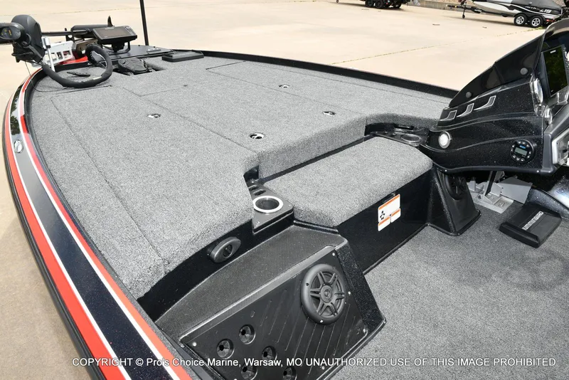 Slide: The Image of 2020 Nitro Z20 Pro boat interior with steering console and carpeted deck. - 11