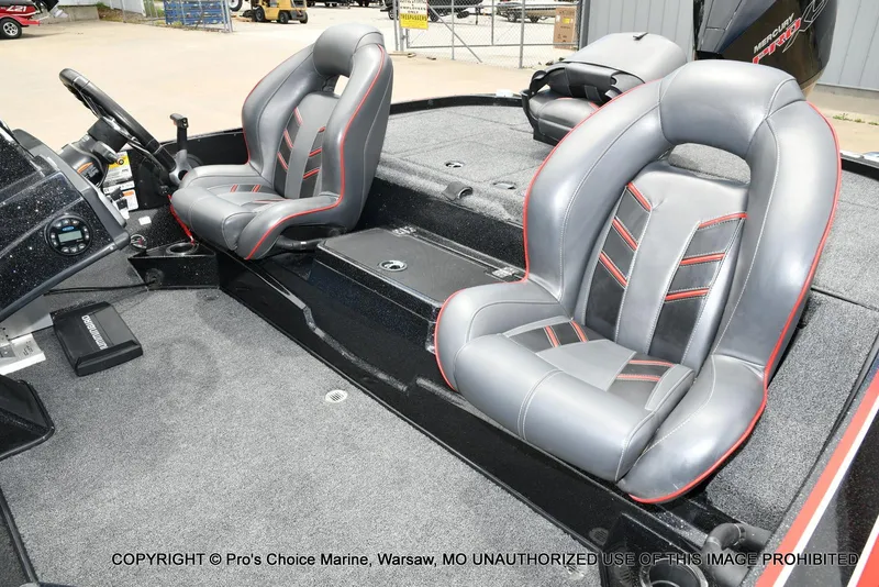 Slide: The Image of 2020 Nitro Z20 Pro boat interior with gray and red seats, featuring a Mercury Pro-XS engine. - 13