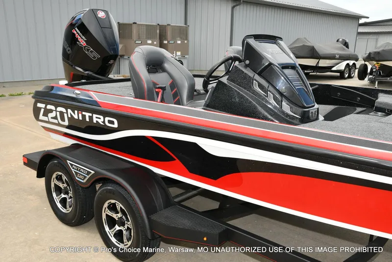 Slide: The Image of 2020 Nitro Z20 Pro boat with 250 Pro-XS 4 Stroke engine, parked on a trailer. - 15