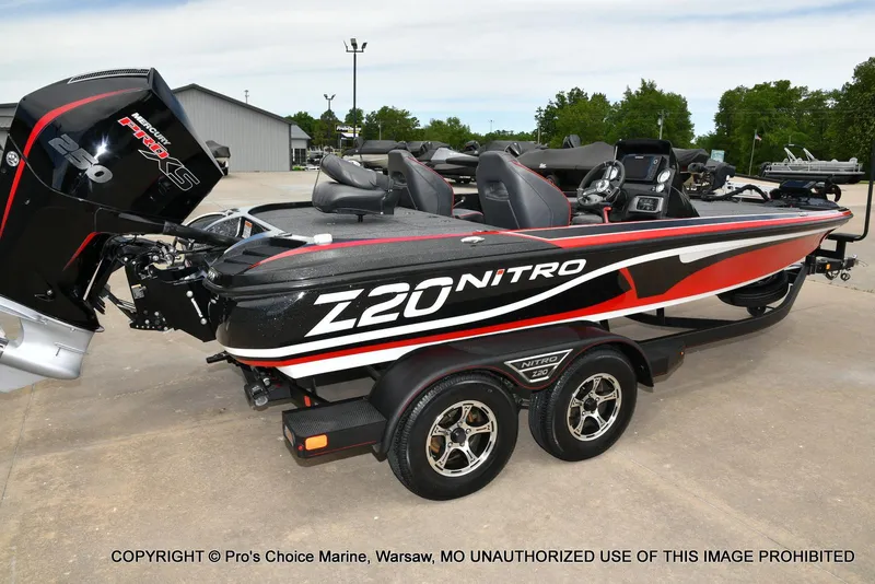 Slide: The Image of 2020 Nitro Z20 Pro boat with 250 Pro-XS 4 Stroke engine, parked outdoors. - 18