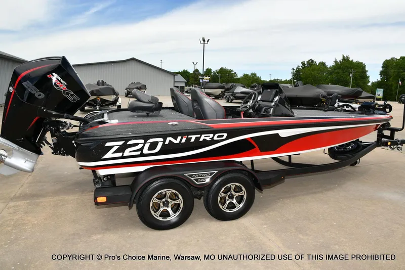 Slide: The Image of 2020 Nitro Z20 Pro boat with 250 Pro-XS 4 Stroke engine, parked outdoors. - 19