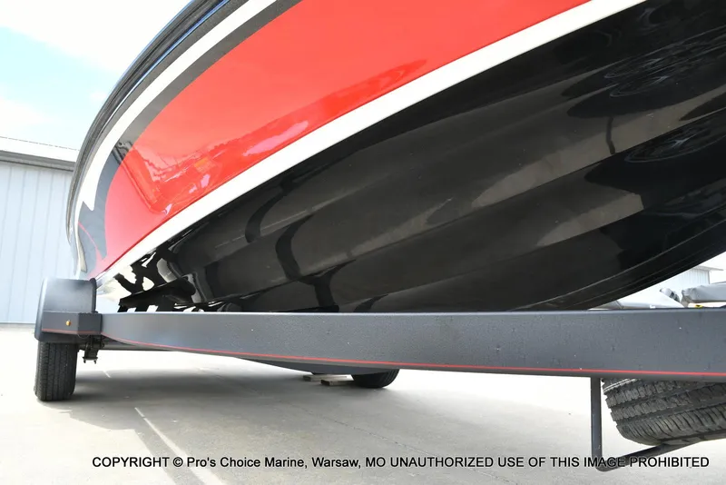 Slide: The Image of 2020 Nitro Z20 Pro boat on trailer, red and black hull, side view. - 35