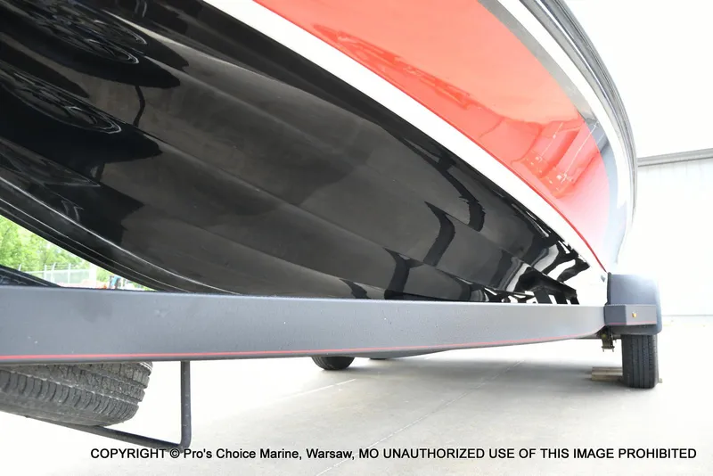 Slide: The Image of 2020 Nitro Z20 Pro boat underside view on trailer, showcasing sleek design. - 36