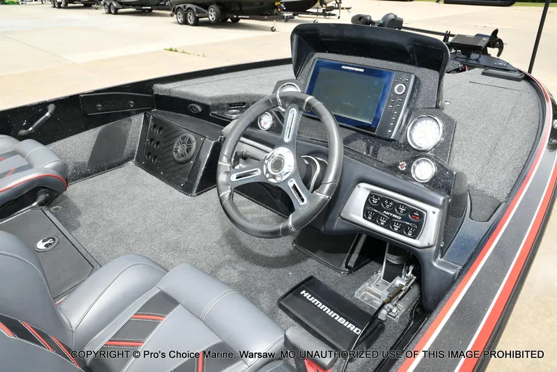 Slide: The Image of 2020 Nitro Z20 Pro boat interior with steering wheel, dashboard, and Humminbird electronics. - 4