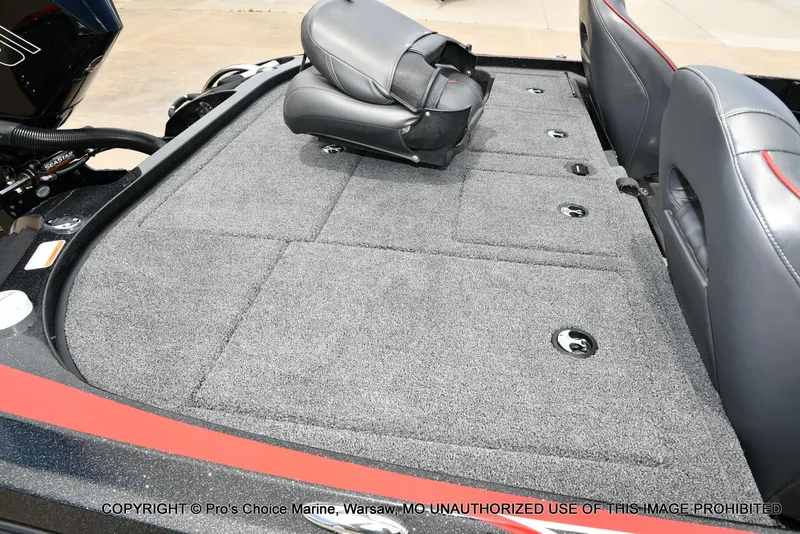 Slide: The Image of 2020 Nitro Z20 Pro boat interior with carpeted deck and seating. - 40