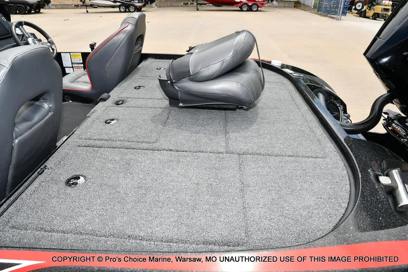 Slide: The Image of 2020 Nitro Z20 Pro boat interior with gray seating and carpeted deck. - 42