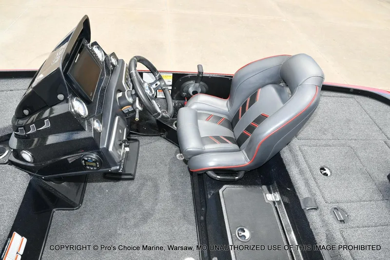 Slide: The Image of 2020 Nitro Z20 Pro boat interior with steering console and cushioned seat. - 46