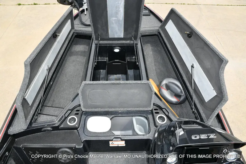 Slide: The Image of 2020 Nitro Z20 Pro boat interior with open storage compartments and engine view. - 6