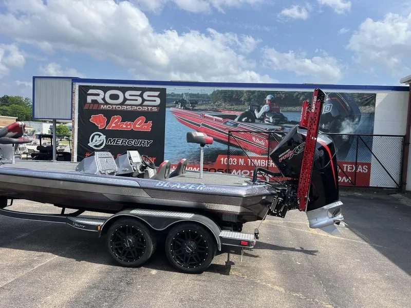 Slide: The Image of 2022 Blazer 650 Pro Tour boat at Ross Motorsports dealership, featuring Mercury engine. - 10
