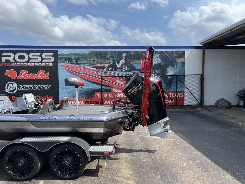 Slide: The Image of 2022 Blazer 650 Pro Tour boat at Ross Motorsports dealership, featuring Mercury engine. - 14
