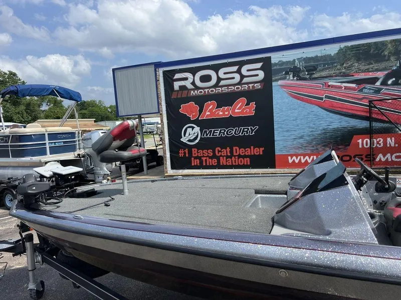 Slide: The Image of 2022 Blazer 650 Pro Tour boat at Ross Motorsports dealership, sunny day. - 20