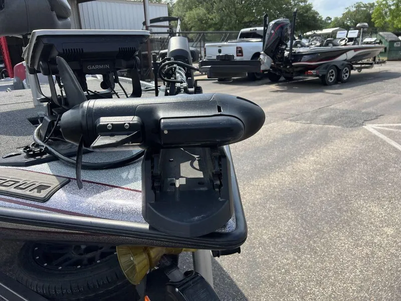 Slide: The Image of 2022 Blazer 650 Pro Tour boat with Garmin equipment, parked in a lot. - 29