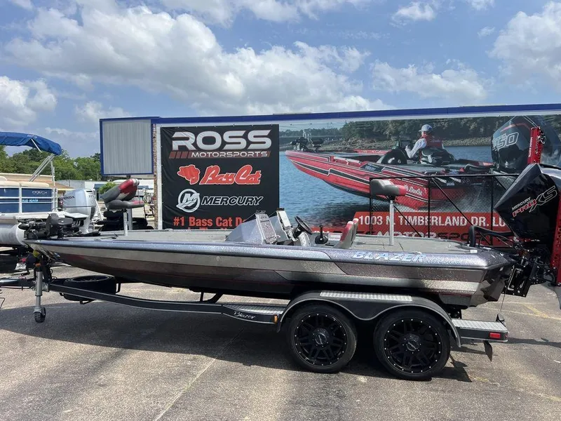 Slide: The Image of 2022 Blazer 650 Pro Tour boat on trailer at Ross Motorsports dealership. - 3