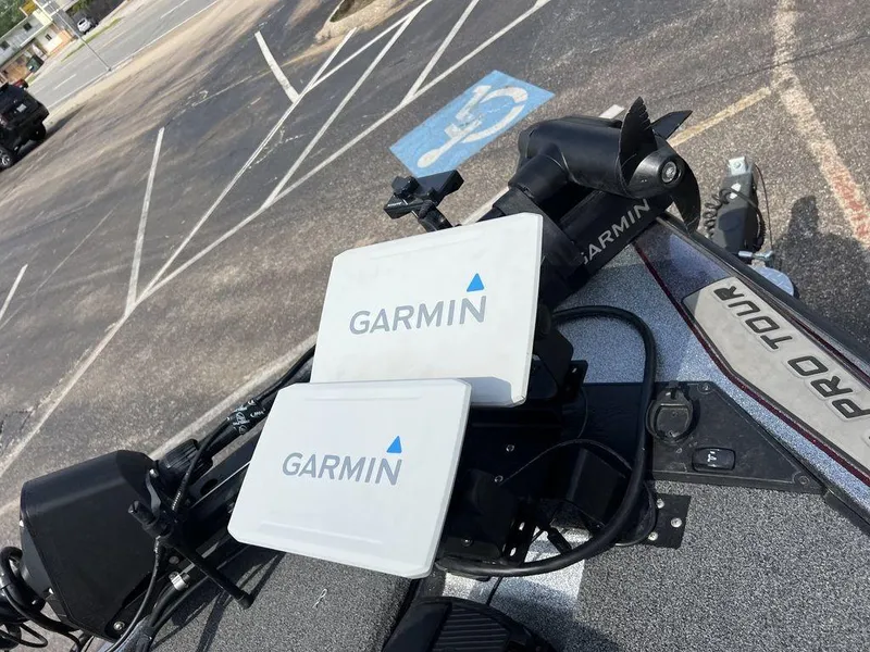 Slide: The Image of Garmin equipment on a 2022 Blazer 650 Pro Tour boat in a parking lot. - 31