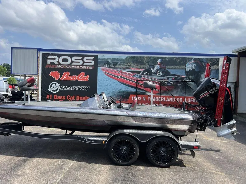 Slide: The Image of 2022 Blazer 650 Pro Tour boat at Ross Motorsports dealership, featuring Mercury engine. - 4