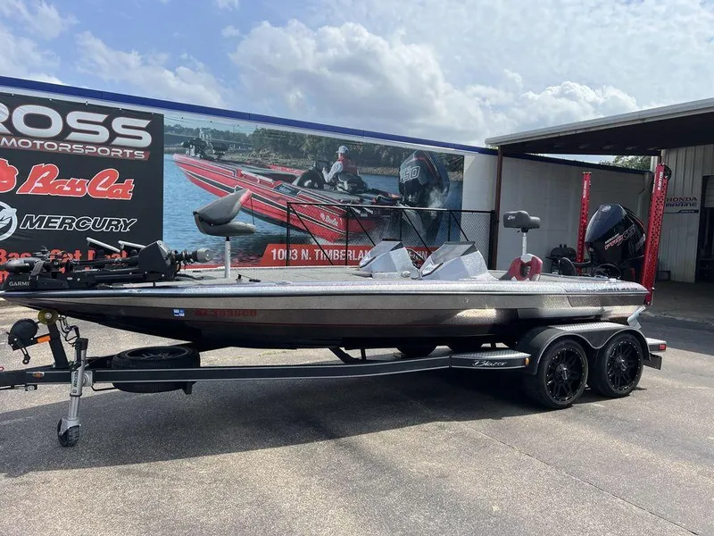 Slide: The Image of 2022 Blazer 650 Pro Tour boat on trailer at dealership, featuring sleek design and modern equipment. - 6