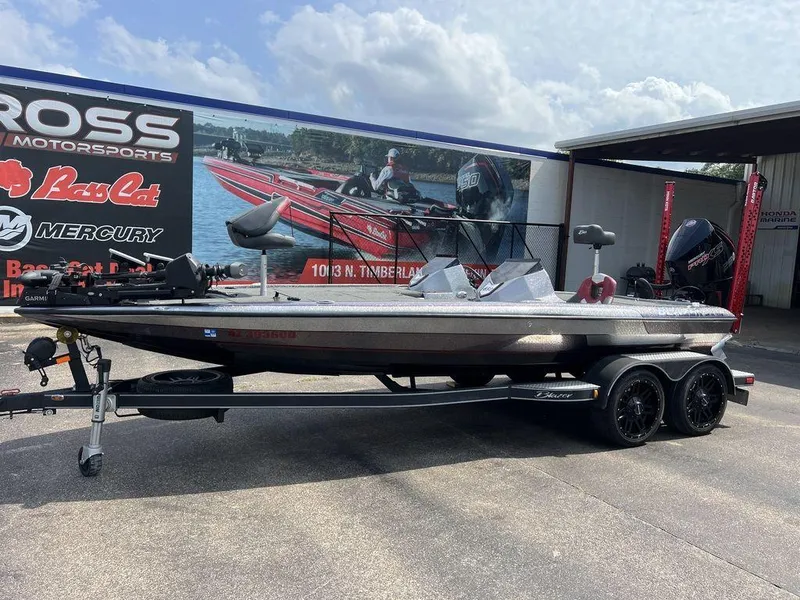Slide: The Image of 2022 Blazer 650 Pro Tour boat on trailer at dealership. - 7