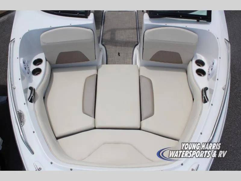 Slide: The Image of 2023 Monterey 224 FS/BR boat interior with beige seating and cup holders. - 12