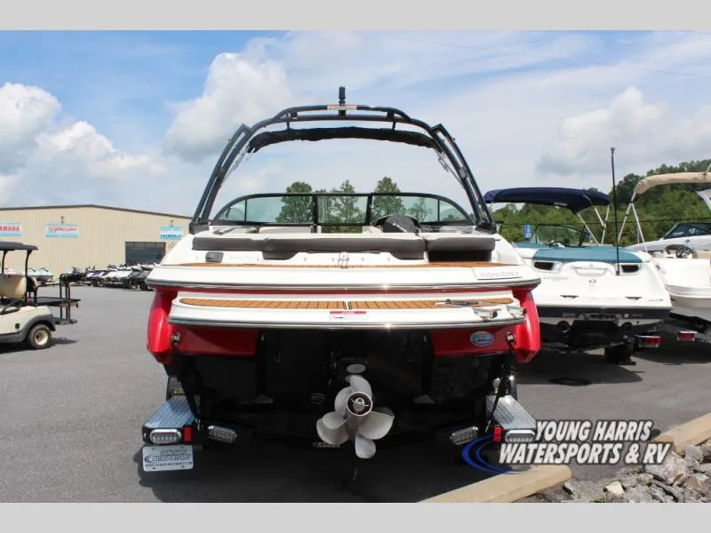 Slide: The Image of 2023 Monterey 224 FS/BR boat displayed at Young Harris Watersports & RV dealership. - 3