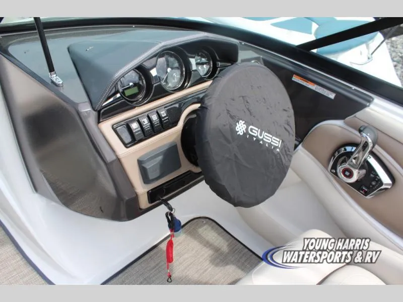 Slide: The Image of 2023 Monterey 224 FS/BR boat dashboard with Gussi Italia steering wheel cover. - 8