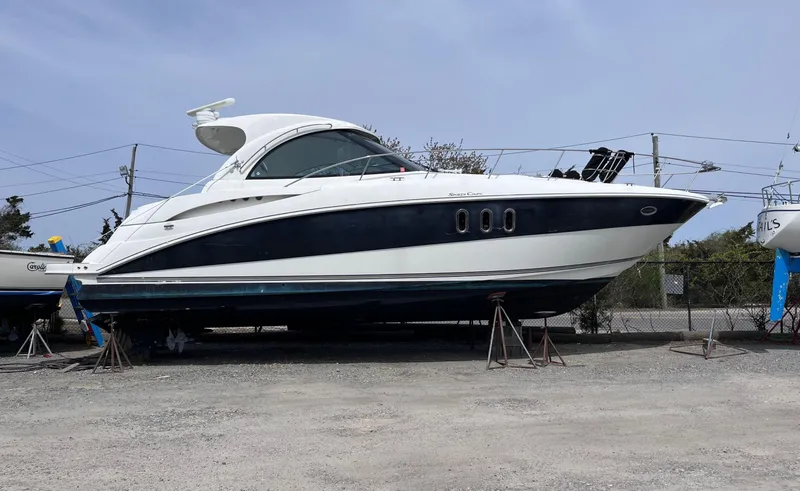 Slide: The Image of 2009 Cruisers Yachts 390 Sports Coupe on dry dock, side view. - 2