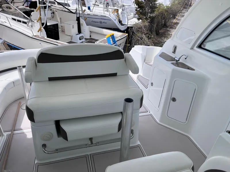 Slide: The Image of 2009 Cruisers Yachts 390 Sports Coupe interior with seating and kitchenette area. - 7