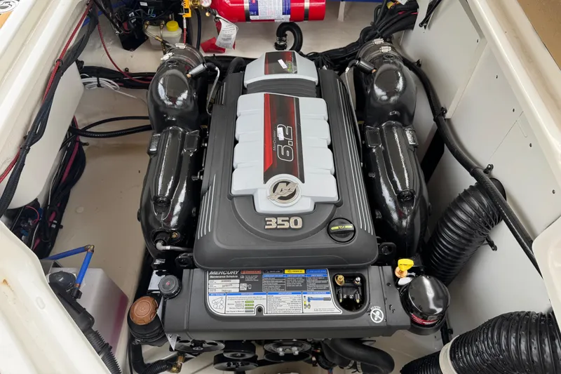 Slide: The Image of Engine compartment of 2025 Sea Ray SDX 270 Surf with 6.2L 350 horsepower engine. - 15