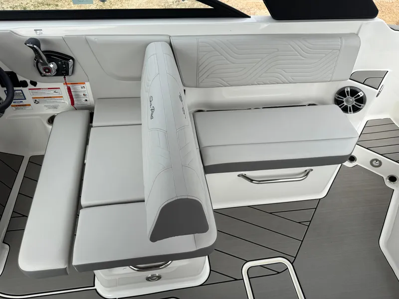 Slide: The Image of 2025 Sea Ray SDX 270 Surf boat interior with sleek seating and modern design. - 7