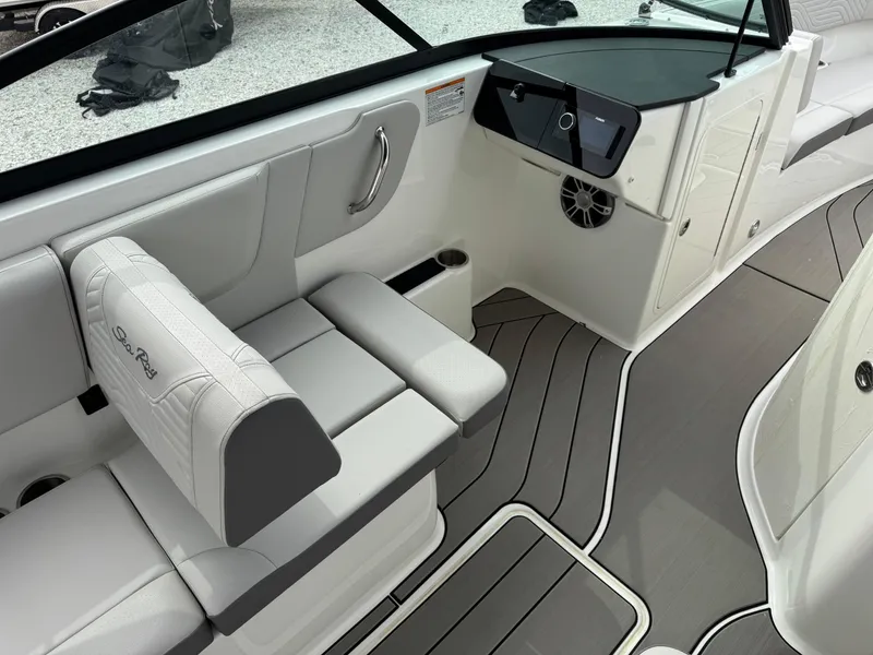 Slide: The Image of 2025 Sea Ray SDX 270 Surf interior with sleek seating and modern design. - 8