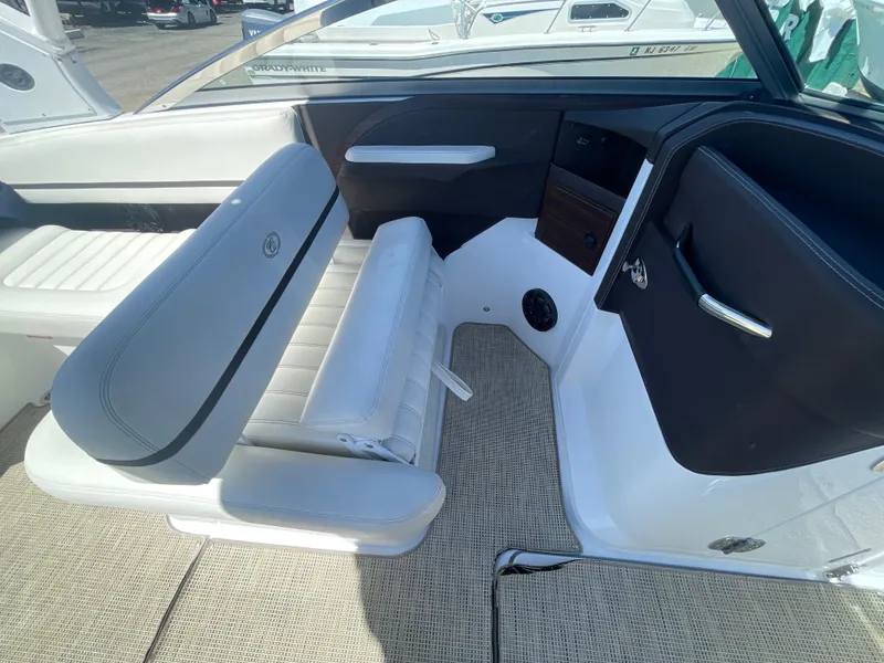 Slide: The Image of 2016 Cobalt R5 boat interior with white seating and modern design. - 26