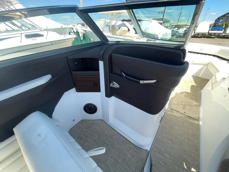 Slide: The Image of Interior of a 2016 Cobalt R5 boat, featuring sleek seating and modern design elements. - 27