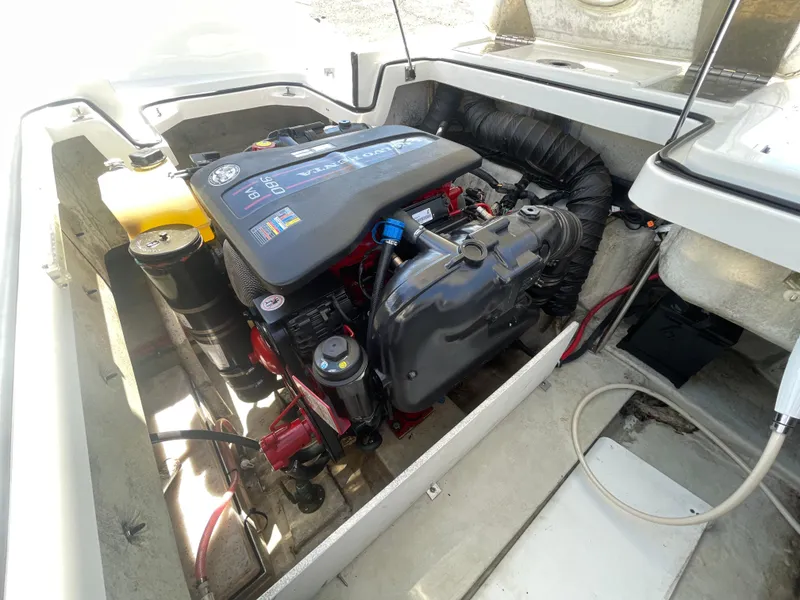 Slide: The Image of Engine compartment of a 2016 Cobalt R5 boat, showcasing detailed mechanical components. - 39