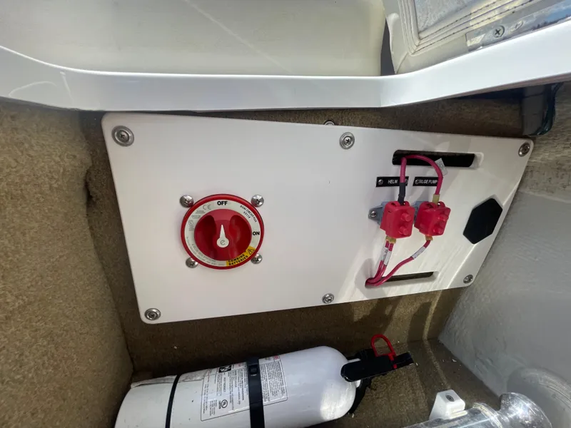Slide: The Image of 2016 Cobalt R5 boat battery switch panel with fire extinguisher. - 43