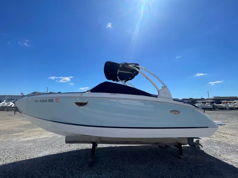Slide: The Image of 2016 Cobalt R5 boat on display under clear blue sky. - 5